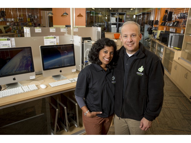 Device Pitstop franchisees Brad Peterson and Mary Anne standing in their Burnsville, MN, store