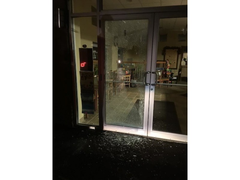 Arrow Shot Through Glass Door Window of Oak Lawn Mayor's...