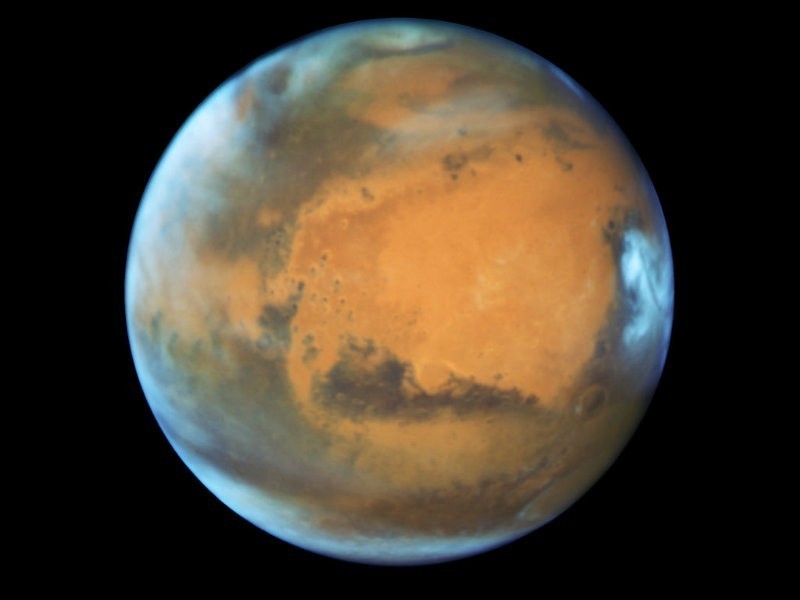 Beyond Those Clouds: Mars Is The Brightest It's Been In A Decade