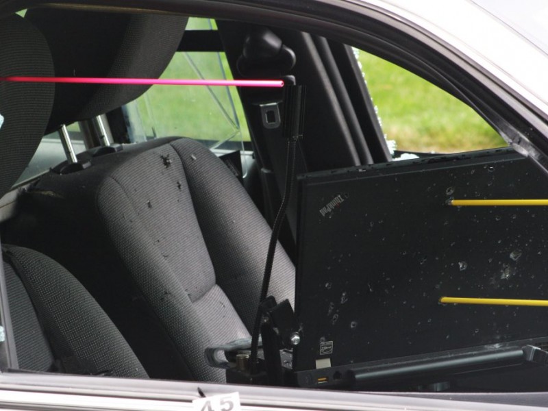 Bearcat Survived Standoff; Police Cars Did Not