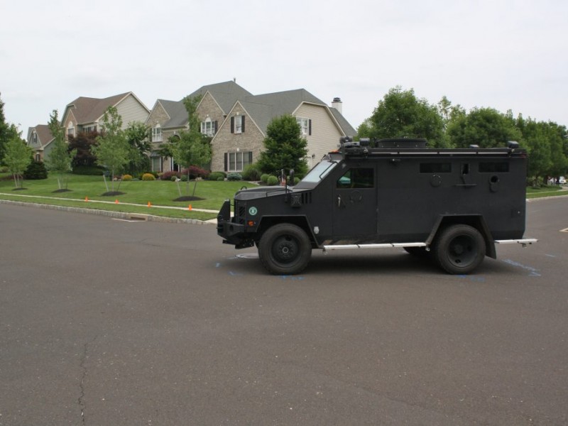 Bearcat Survived Standoff; Police Cars Did Not